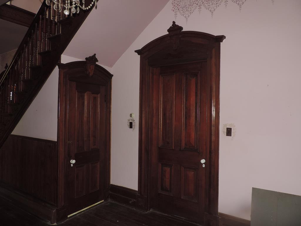 Walnut doors in main hallway